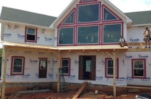 Working across the front of the house with the porch roof.