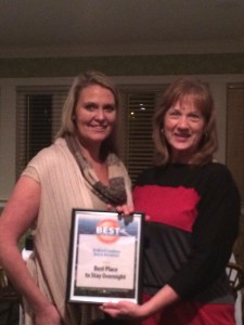 Karen Receiving the Best Place to Stay at Smith Mountain Lake Award from Mishelle Brosinski.