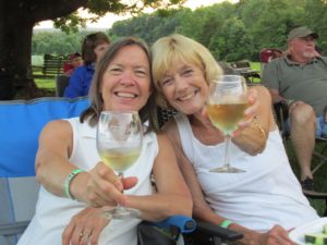 Two friends toasting the sunset at Hickory Hill Winery.