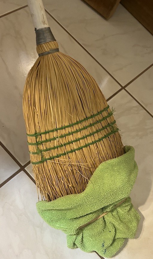 Mop with cleaning rag attached with rubberband
