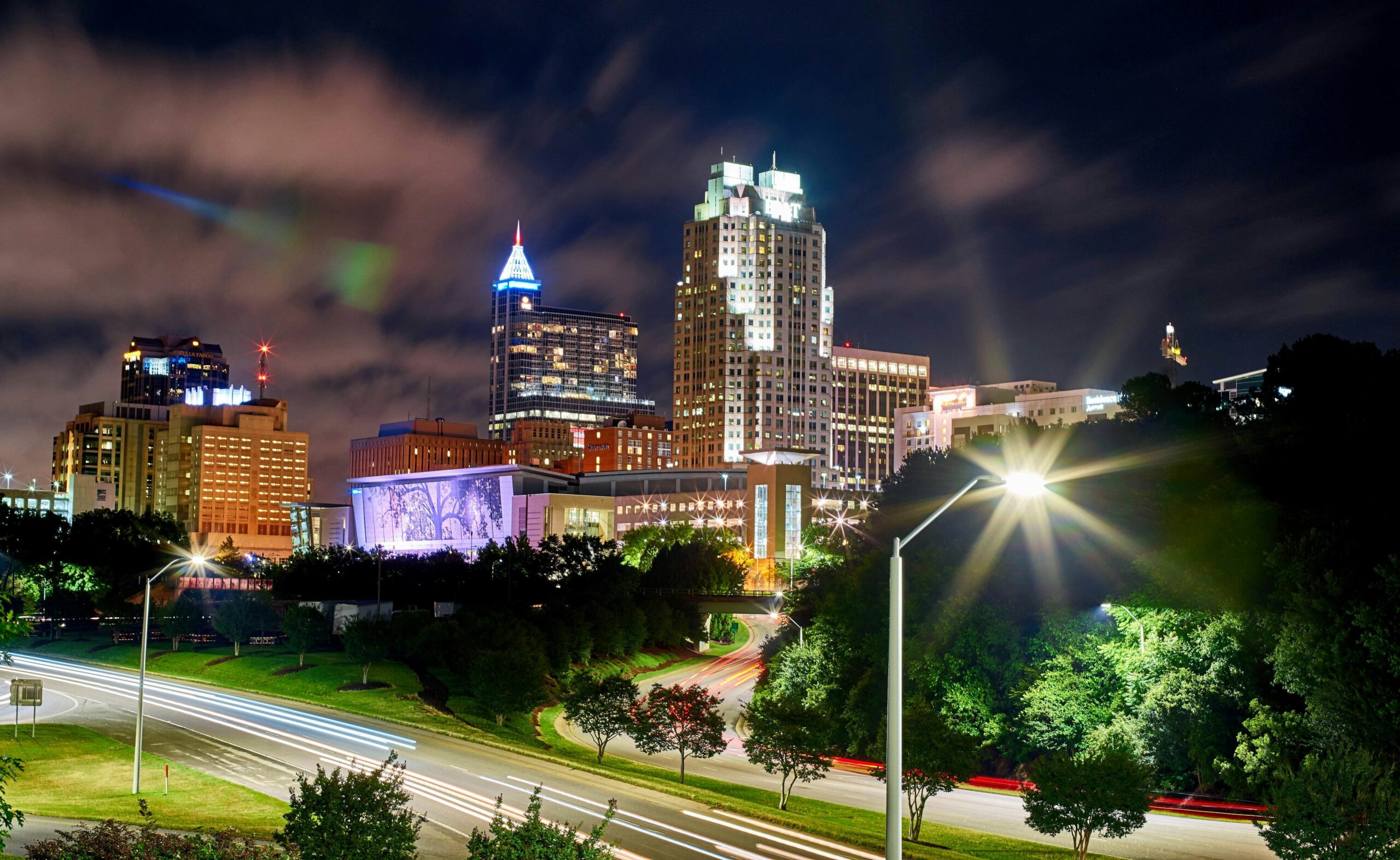 Raleigh North Carolina skyline at night for guests traveling to Bedford Landings Bed and Breakfast at Smith Mountain Lake Virginia.
