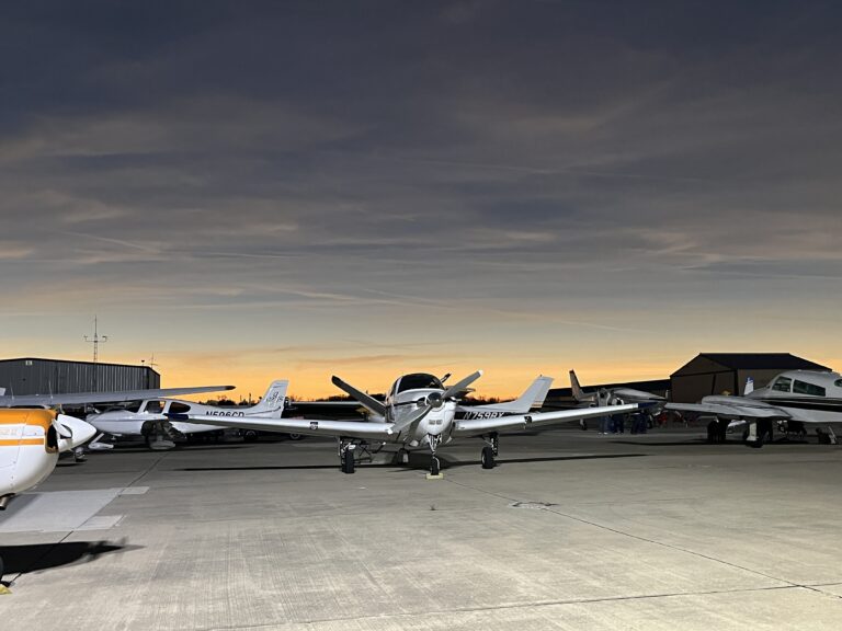 General aviation aircraft parked at a regional airport near Smith Mountain Lake, highlighting fly-in travel and aviation experiences close to Bedford Landings Bed & Breakfast.