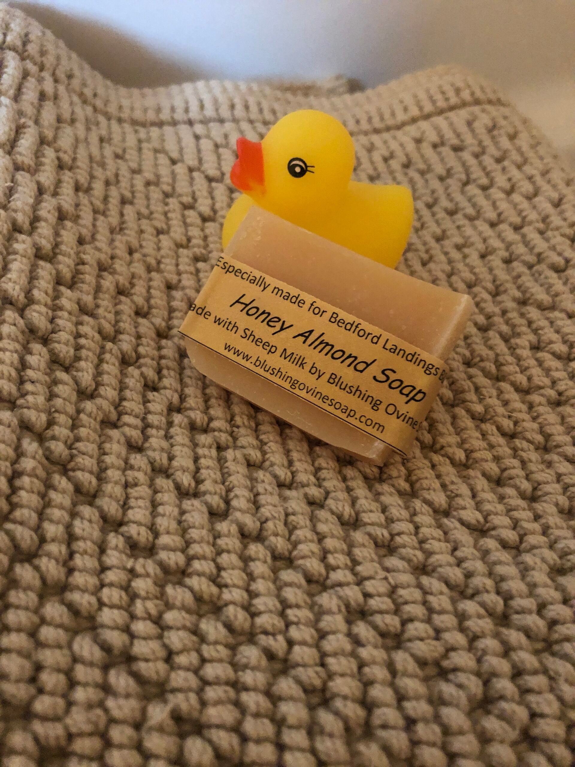 Rubber duck and locally made honey almond guest soap on a textured towel at Bedford Landings Bed & Breakfast near Smith Mountain Lake
