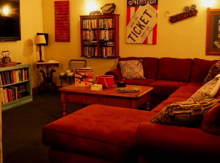 Private theater room with movie collection at Bedford Landings Bed and Breakfast