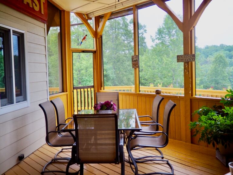 Screened porch dining area at Bedford Landings Bed and Breakfast near Smith Mountain Lake