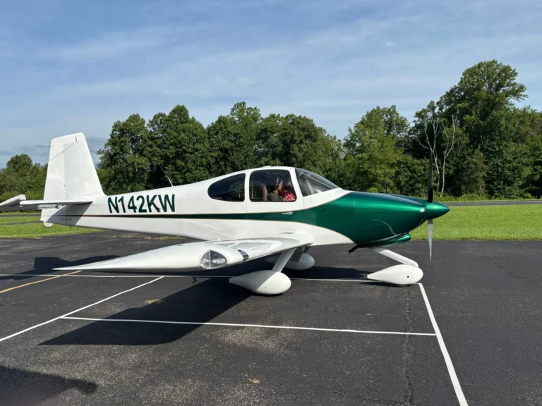 Green-and-white small airplane parked near Bedford Landings Bed & Breakfast, a fly-in friendly bed and breakfast near Smith Mountain Lake, Virginia.