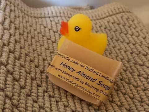 Rubber duck and locally made honey almond guest soap on a textured towel at Bedford Landings Bed & Breakfast near Smith Mountain Lake
