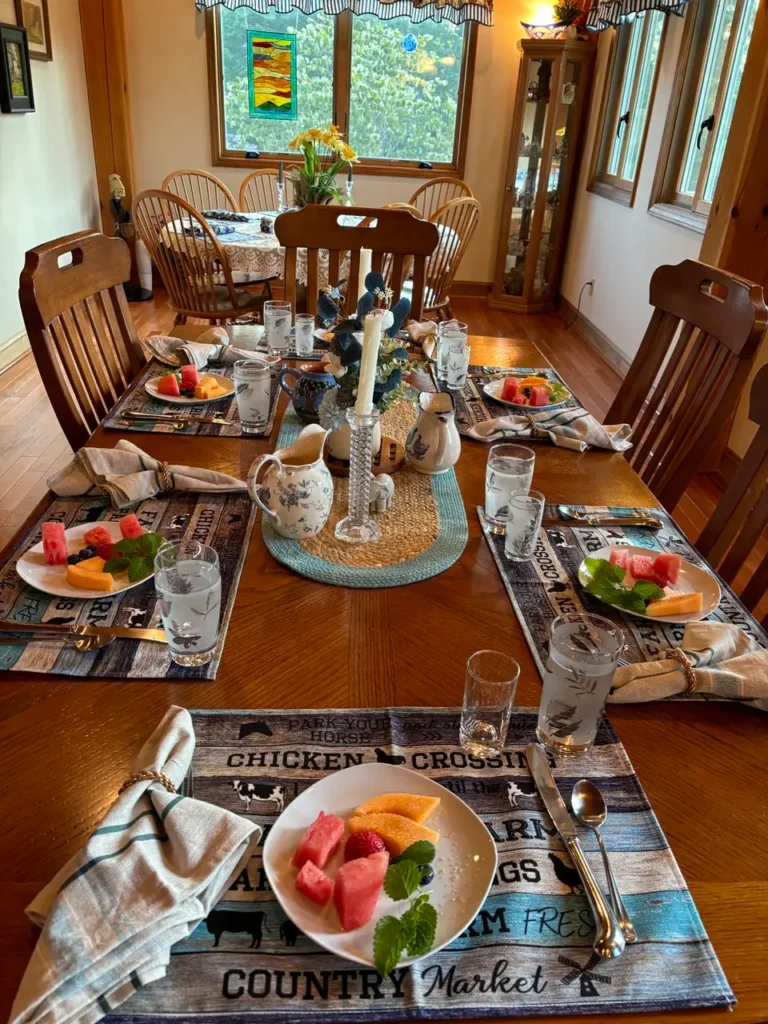 Fresh fruit and a thoughtfully set breakfast table at Bedford Landings Bed & Breakfast near Smith Mountain Lake